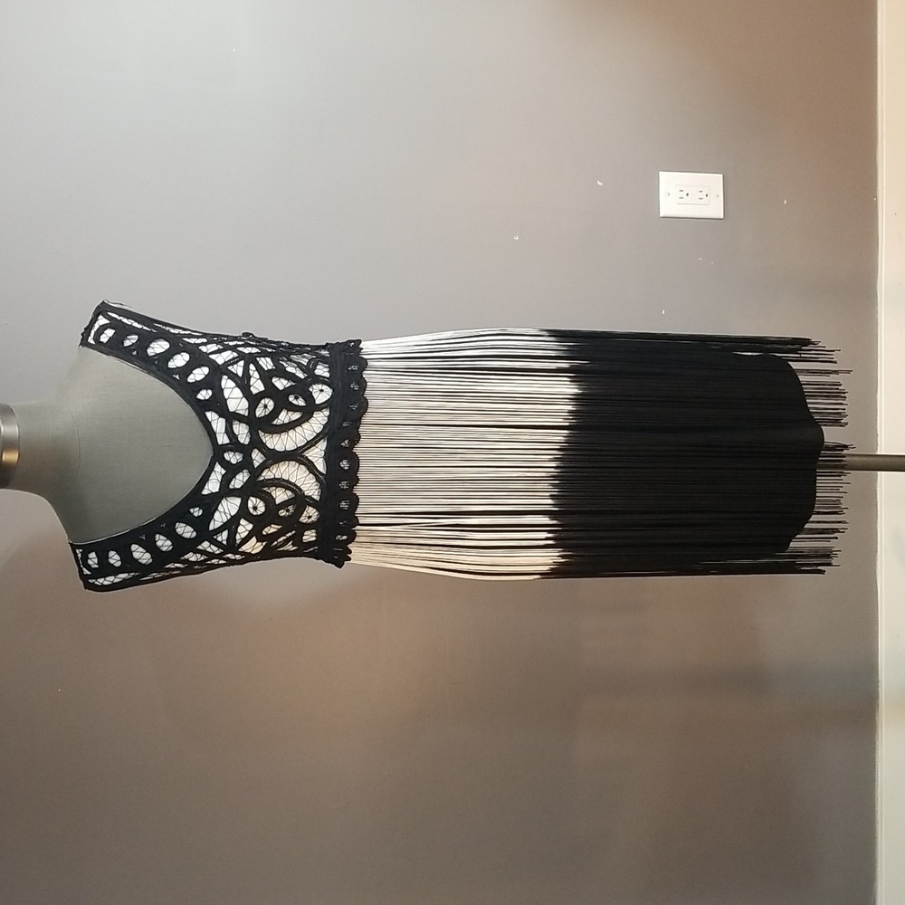 Frank Lyman size 6 black and white dress designer.